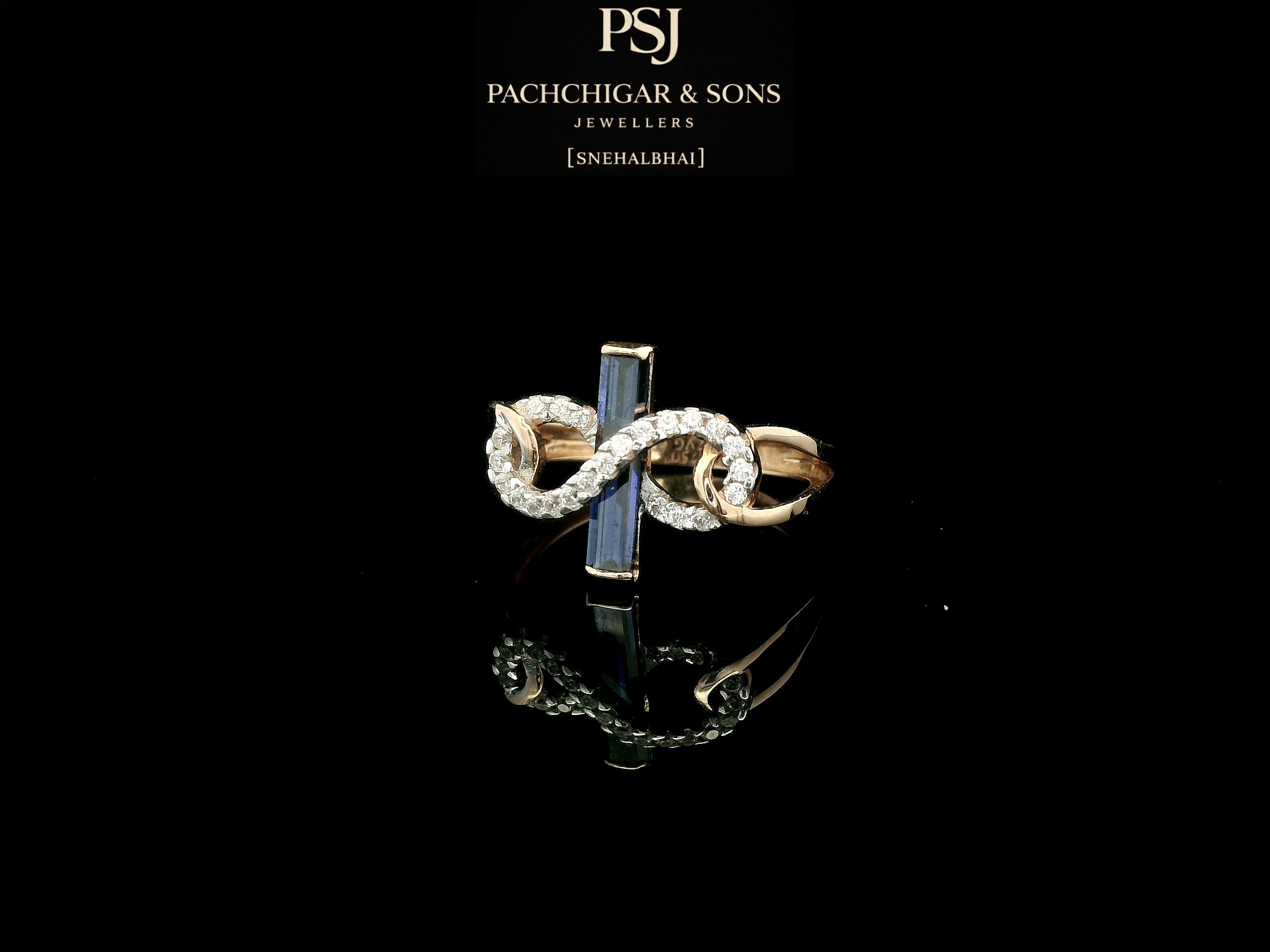 Elegant Diamond Infinity Ring with Blue Baguette Stone Accent