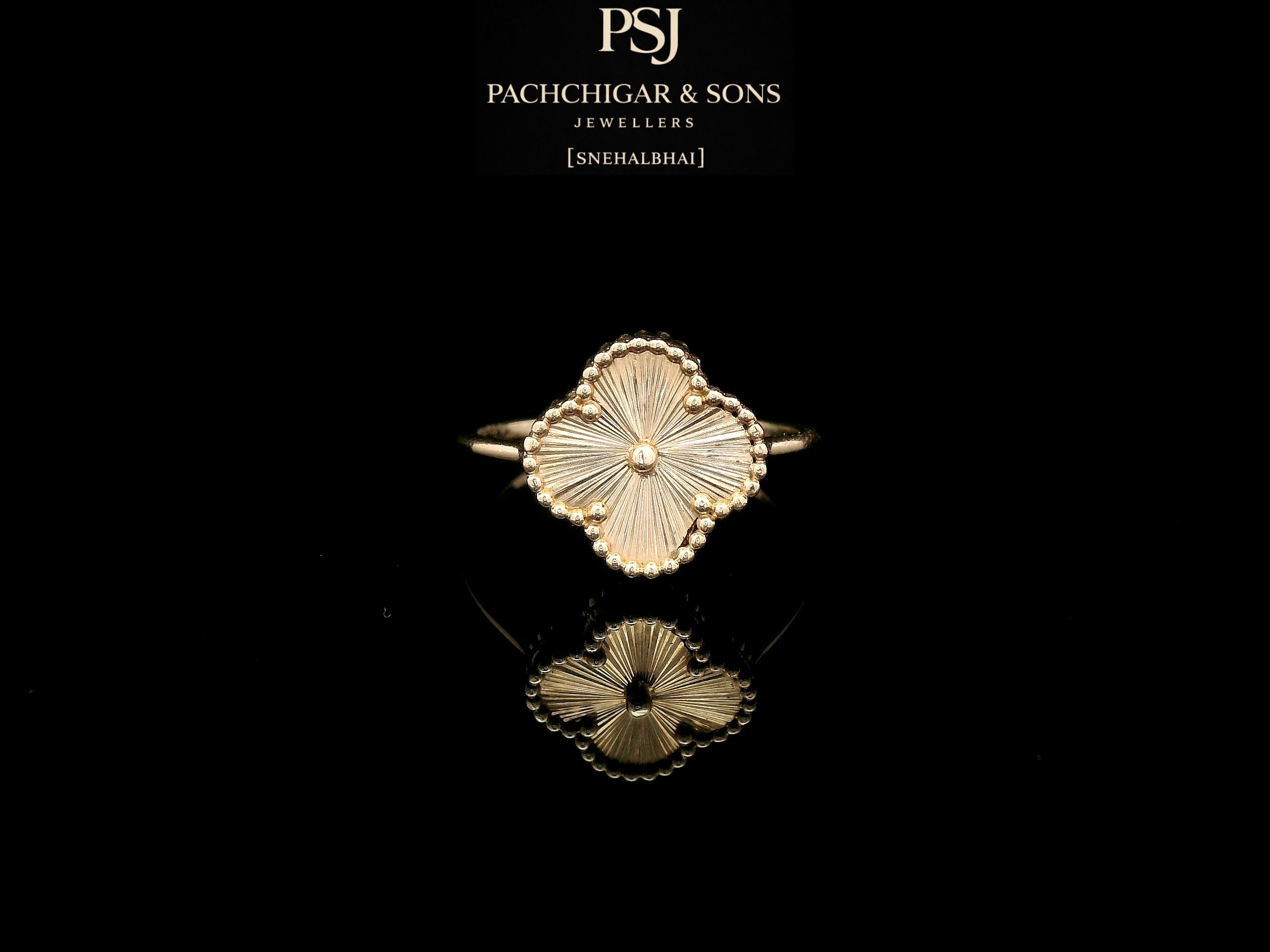 Elegant Clover Motif Gold Ring with Textured Finish