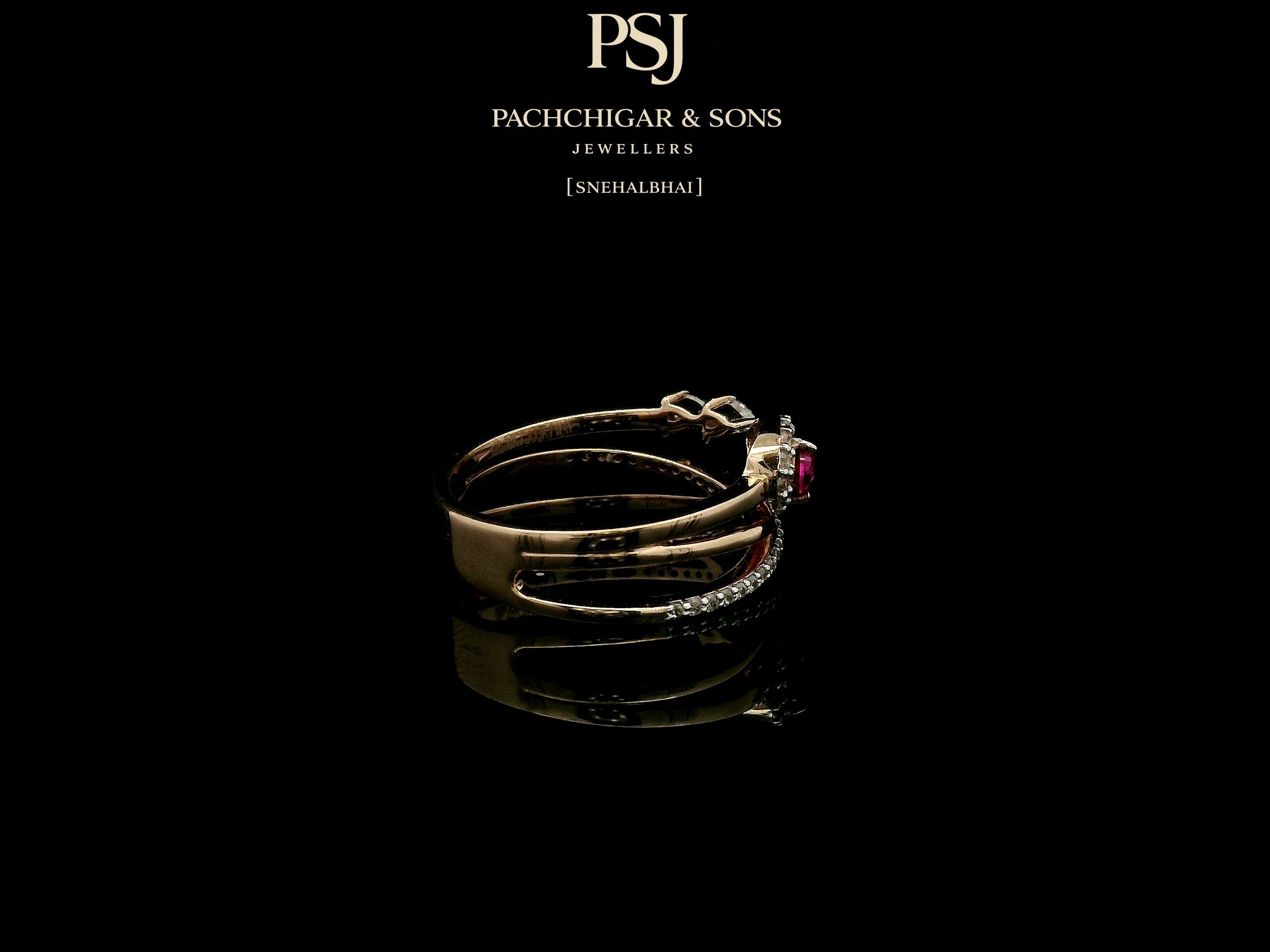 Elegant Ruby Teardrop Diamond Ring with Open Band Design