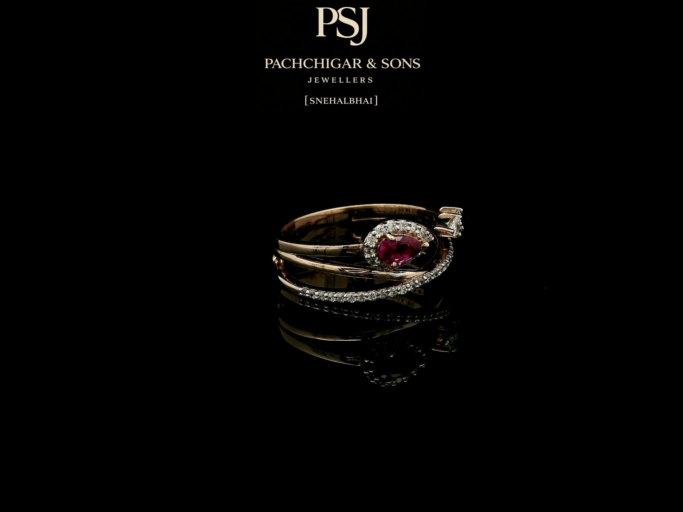 Elegant Ruby Teardrop Diamond Ring with Open Band Design