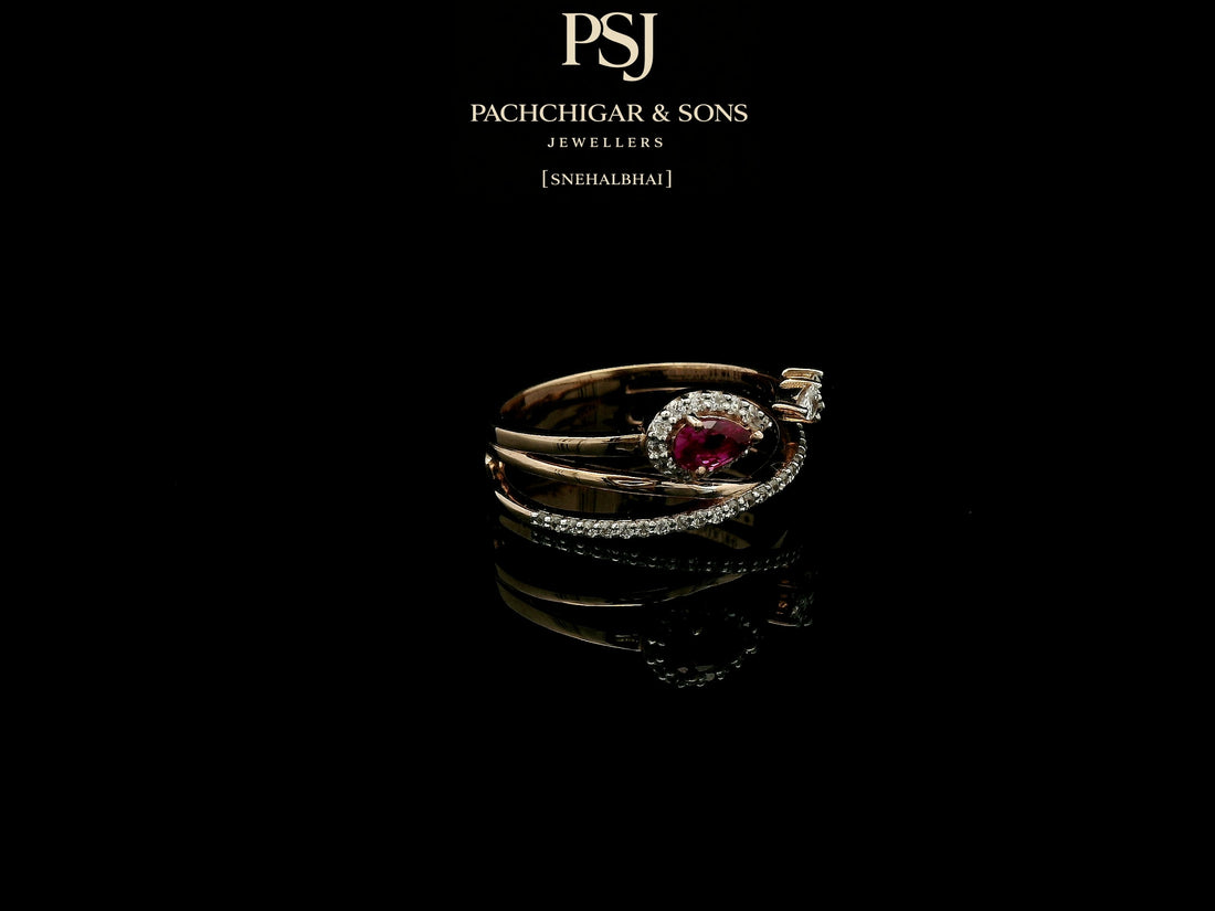 Elegant Ruby Teardrop Diamond Ring with Open Band Design