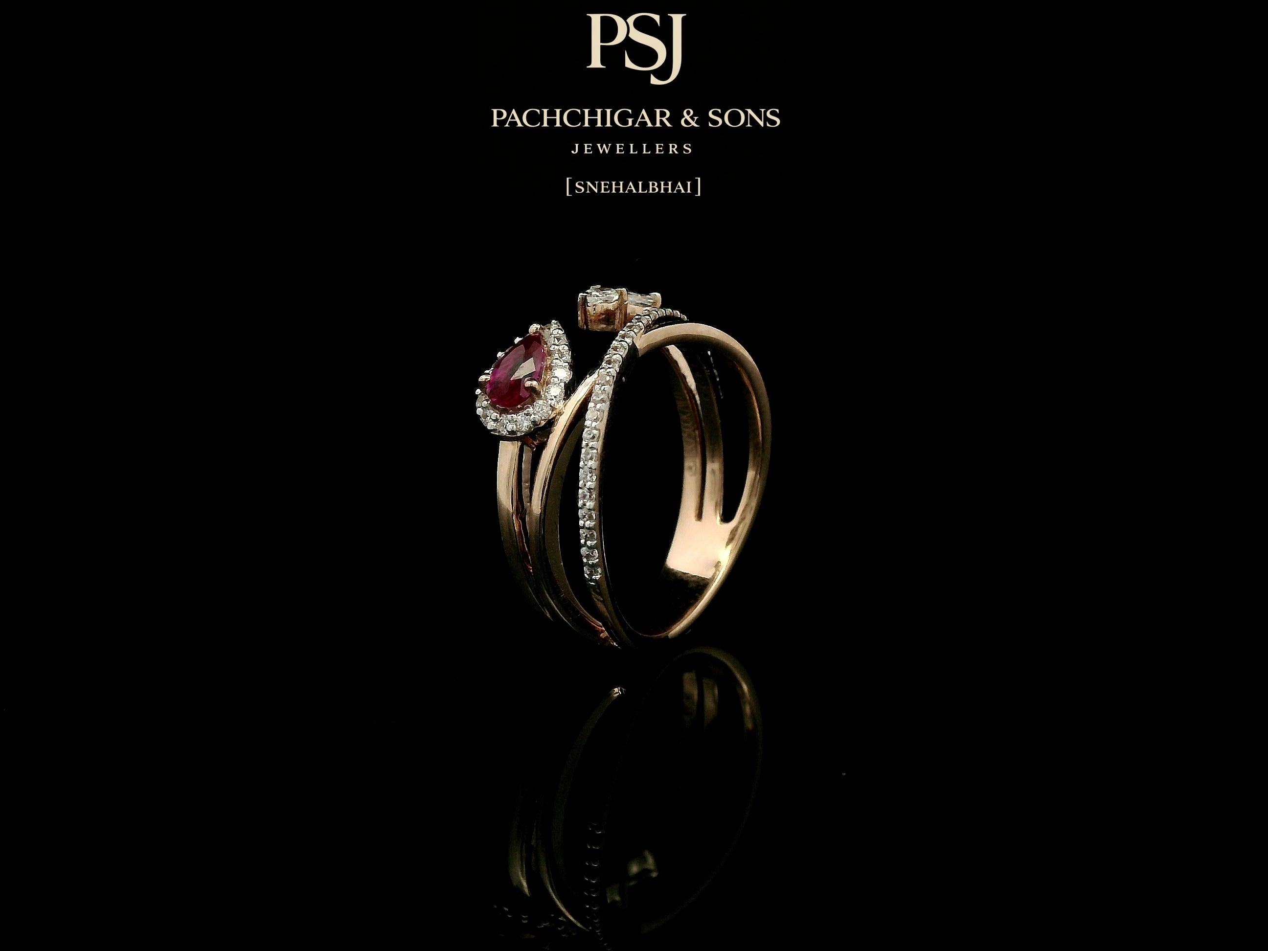Elegant Ruby Teardrop Diamond Ring with Open Band Design
