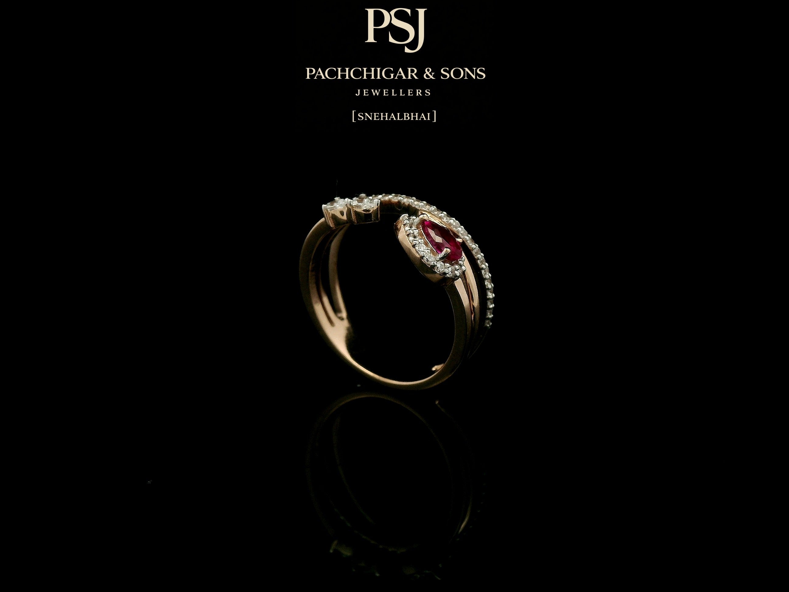 Elegant Ruby Teardrop Diamond Ring with Open Band Design