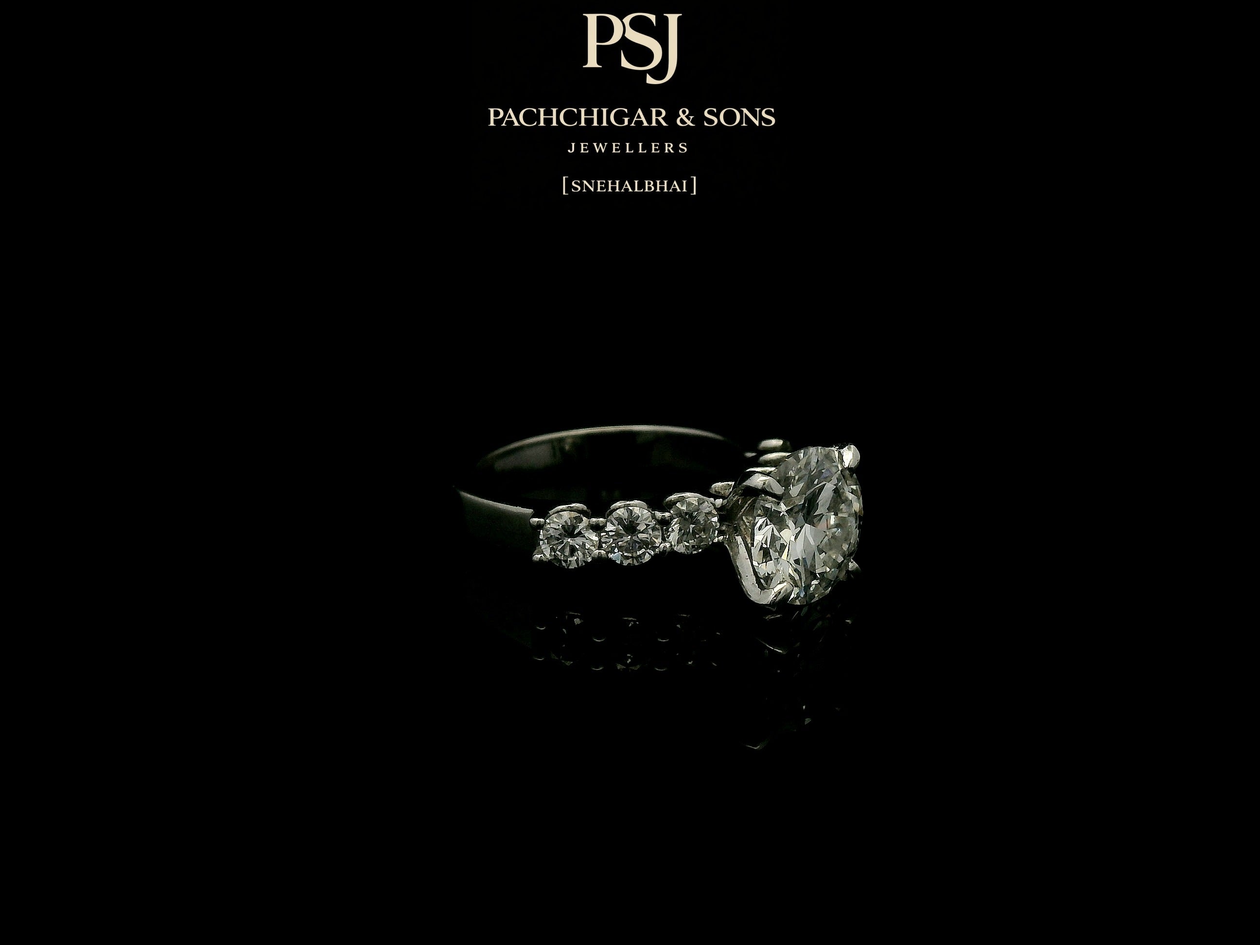 Classic Oval Solitaire Diamond Ring with Side Stone Accents