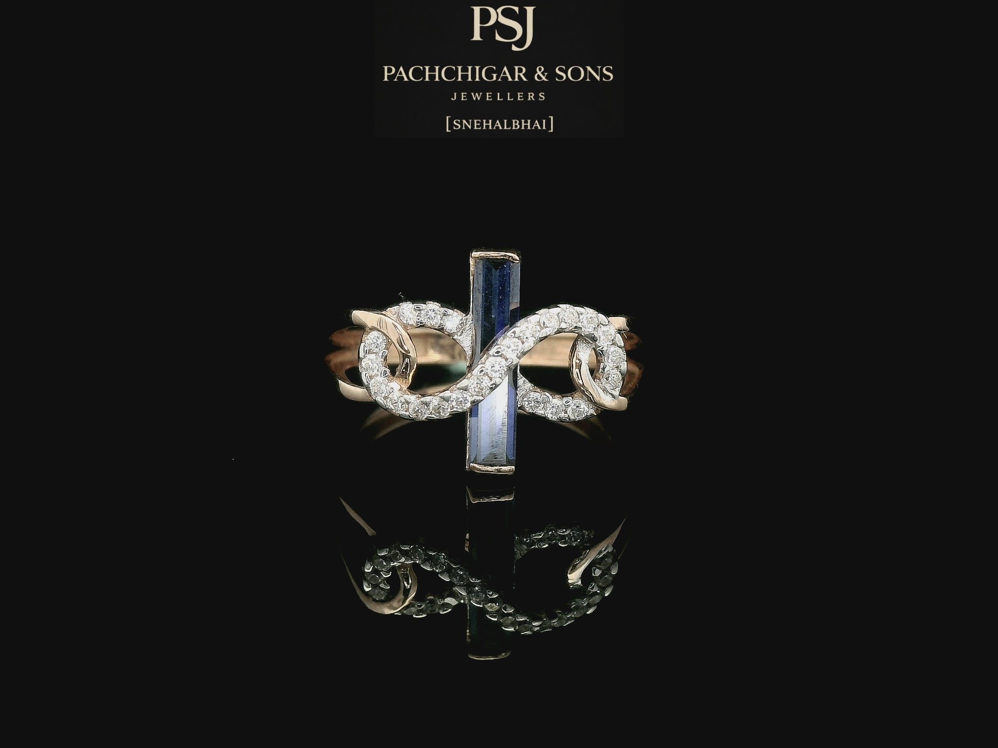 Elegant Diamond Infinity Ring with Blue Baguette Stone Accent